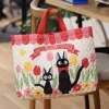 Maison Ghibli Sacoche d'écolier Jiji Tulipes - Kiki la petite sorcière